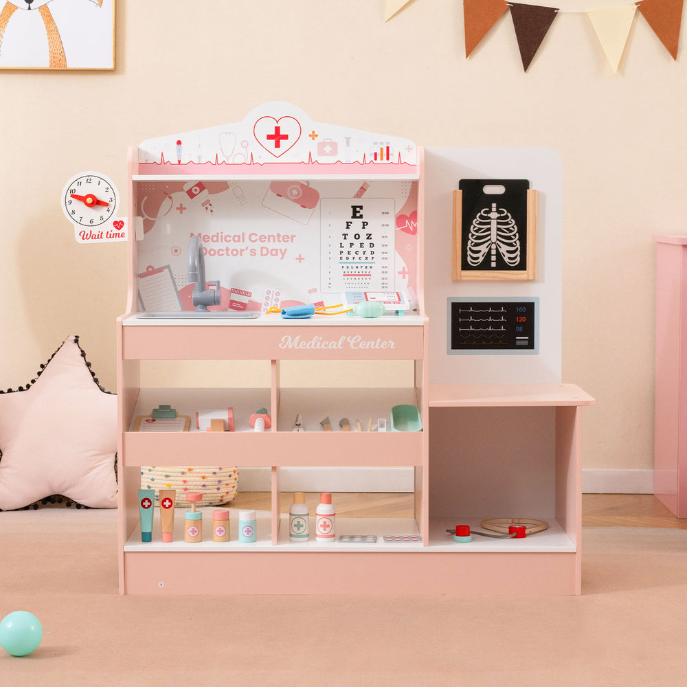 Wooden doctor playset in pink with stethoscope and 24 medical accessories for toddlers, promoting imaginative role play.